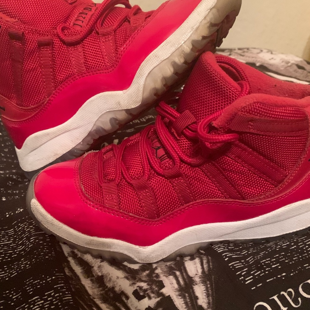 Winning like 96 size 1y Jordan 11 gym red